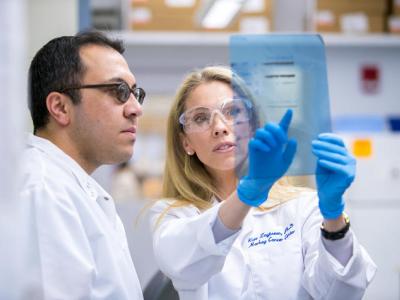 Kate Zaytseva and Naser Jafari studying the importance of an enzyme