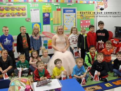 The "tooth fairy" delivers dental kits to a classroom