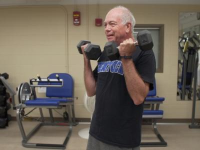 Man lifting barbells