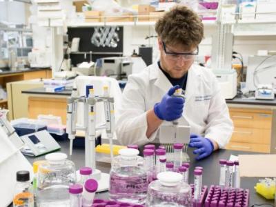 David Henson working in a lab. 