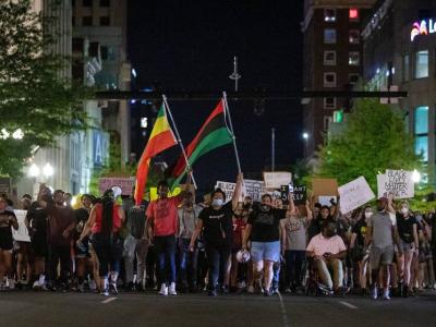 Protesters march through the streets of downtown during the 11th night of protesting police violence in Lexington, Ky., Monday, June 8, 2020. photo by SILAS WALKER, LEXINGTON HERALD-LEADER