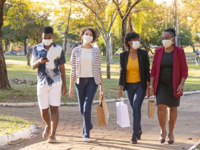 Family Walking Outside with Masks 