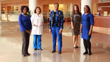 Members of the Disparities Researchers Equalizing Access for Minorities (DREAM) Center, from left to right Adebola Adegboyega, a BSN-PhD student from Nigeria; Assistant Professor Ana Linares; Brenda Combs, program director; Assistant Professor Mollie Aleshire; and Associate Professor Jenna Hatcher who also serves as director of DREAM and the director of diversity and inclusivity.