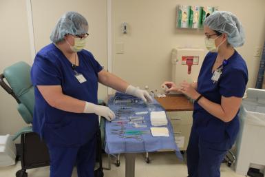 nurses with biopsy supplies