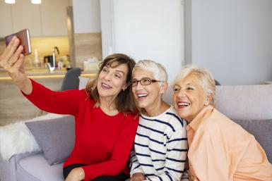 older women taking selfie