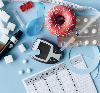 An image of pressure monitor, sugar cubes, and a donut