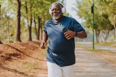African American man running.